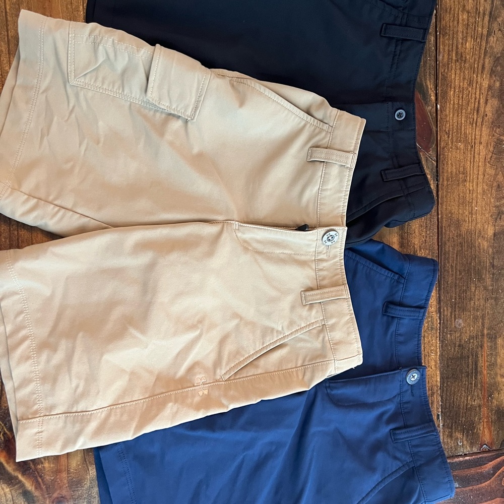 Boys Under Armour shorts- 3 pair; khaki, black and navy blue, good condition